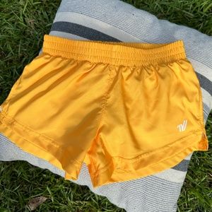 Varsity Spirit Athletic Gold lined shorts youth medium